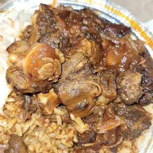 Oxtail n white rice with cole slaw.