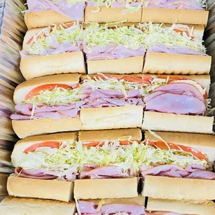 a tray full of sandwiches