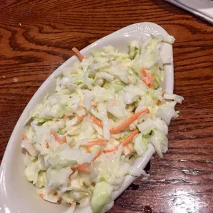 Coleslaw. Good portion but bland in taste.