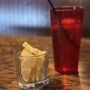 a glass of lemonade and a glass of lemonade