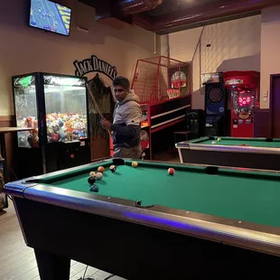 a man playing pool