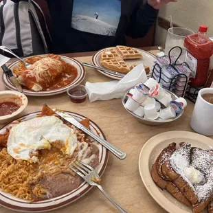 Chilaquiles con Huevos, Chile Colorado Burrito, Waffle, Side of French Toast (4 Halves)