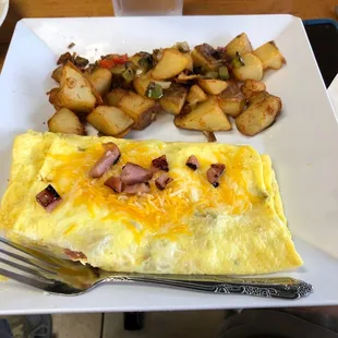 an omelet and potatoes