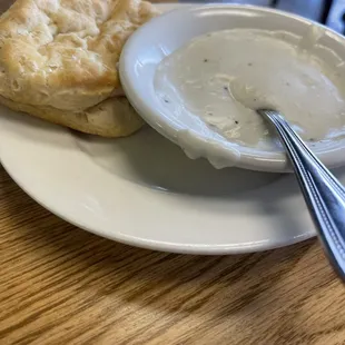Homemade biscuit came with a side of gravy!