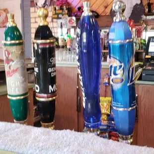 a row of beer taps