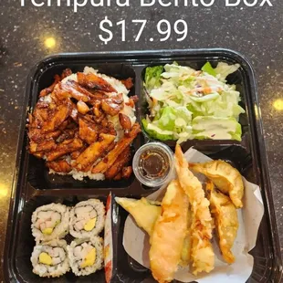 a bento box of food