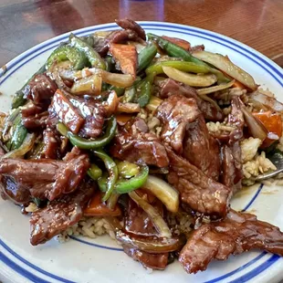 Mongolian Beef on top some bomb ass fried rice!