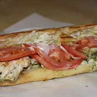 a chicken and tomato sandwich