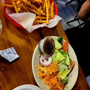 The only vegan thing you can order. Fries and garden salad with balsamic dressing