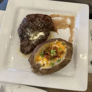 a steak and a baked potato