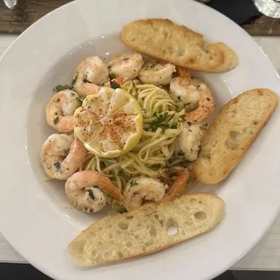a plate of pasta and shrimp