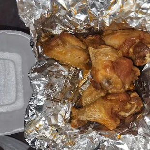 Chicken wings no sauce on the wings  but only gave me half inch little tubs of blue cheese and Buffalo sauce to add myself