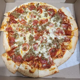 Pepperoni &amp; sausage pizza, Looks Like it was just thrown into the box without any care ! ! !  Hardly NO CHEESE