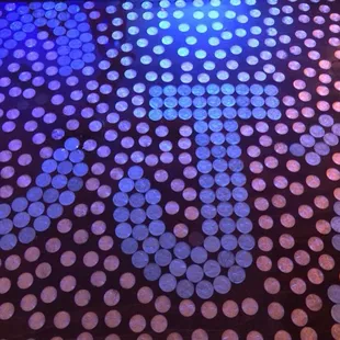 a close up of a table covered in circles