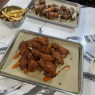 buffalo sauce and garlic parm! Monday night was $1 wing night