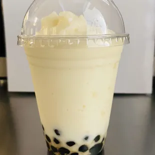 Pineapple and coconut ice blend with boba