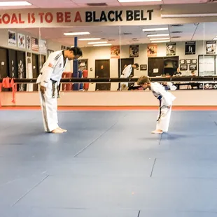 Master Lee and his student begin the belt test.