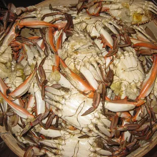 a bowl of crab legs