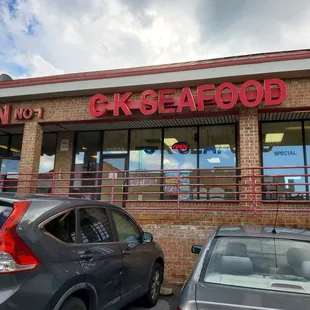 cars parked in front of the restaurant