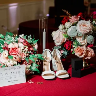 CL decor's floral centerpiece is the one on the right along with the candles