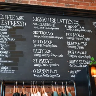 a menu on a brick wall