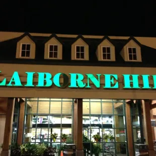 the front of a store at night