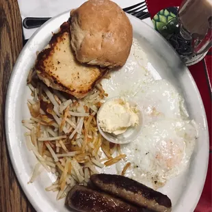 Sausage, eggs, hash browns, and biscuit.