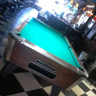 a pool table in a restaurant