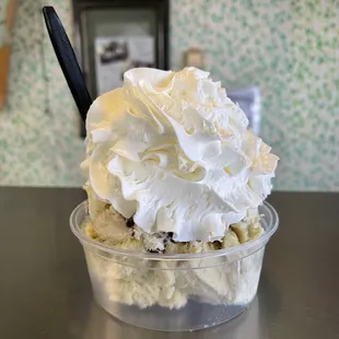 &quot;Single&quot; scoop with whipped cream half banana walnut &amp; tin roof sundae