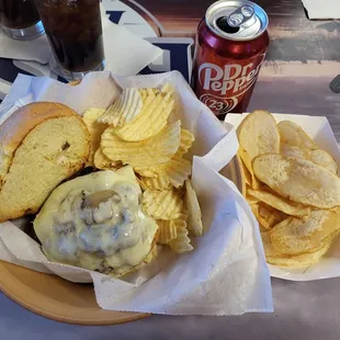 Double patty , swiss and mushroom burger...hot and tasty. Oh yeah...house made chips on the side (undercooked unfortunately).