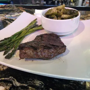 This is supposedly a 10oz Wednesday Steak Day Special. More like 5oz. Also, very small amount of asparagus.