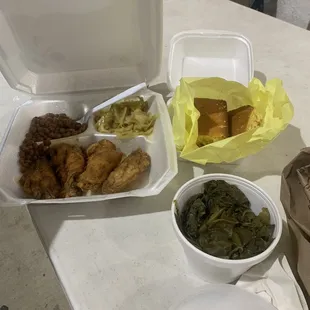 Fried wings (plain) cabbage greens, bbq baked beans, Large Collard greens and cornbread