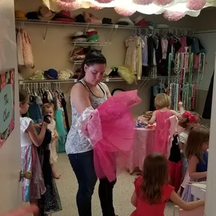 Free for all in the dress up closet.