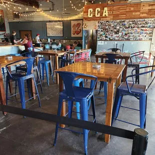 Empty tables where we weren't allowed to sit