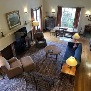 Living room was large leading to other rooms such as the office, kitchen, staircase to upstairs bedrooms and the front door.