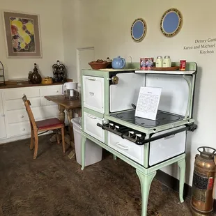 View of kitchen with original stove.