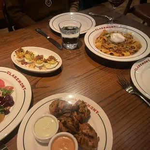 Deviled eggs, winter beet salad, rigatoni bolognese, grilled chicken drums