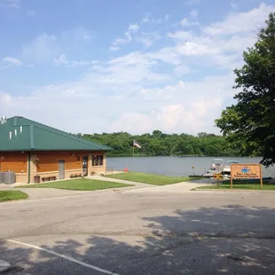 a parking lot next to a lake