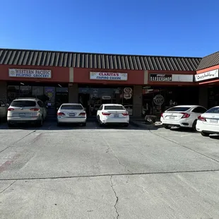 cars parked in front of the restaurant
