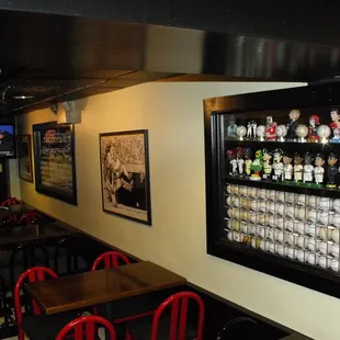 a wall of beer glasses