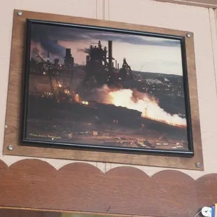 Pics of The Mill, hung above the bar.