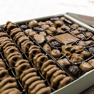 a box of chocolate covered donuts