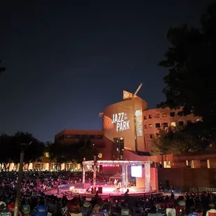 a concert in front of a building