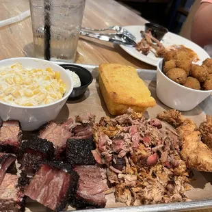 Burnt ends, chopped pork, chicken tenders w cream corn, cornbread &amp; fried okra.