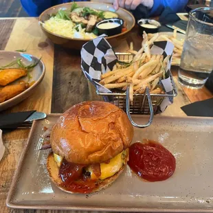 Bacon cheese burger, fries and a salad