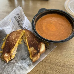 The tomato soup had a great flavor. It had quite a kick, but I like spice. The grilled cheese was good, but I took the pork belly out.
