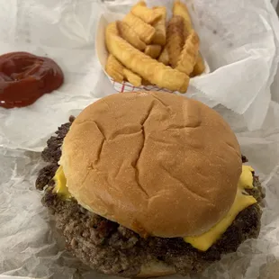 Cheeseburger steak sandwich and fries