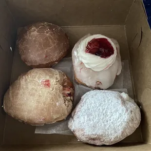 Peanut butter and jelly Bavarian cream filled Jelly and cream cheese filled Hollywood topped donut