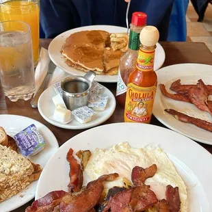 Home fries, eggs over easy, pancakes and bacon... wish I got a shot of the fresh strawberry lemonade. It was FANTASTIC!
