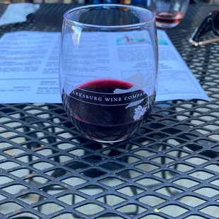 a glass of wine on a table